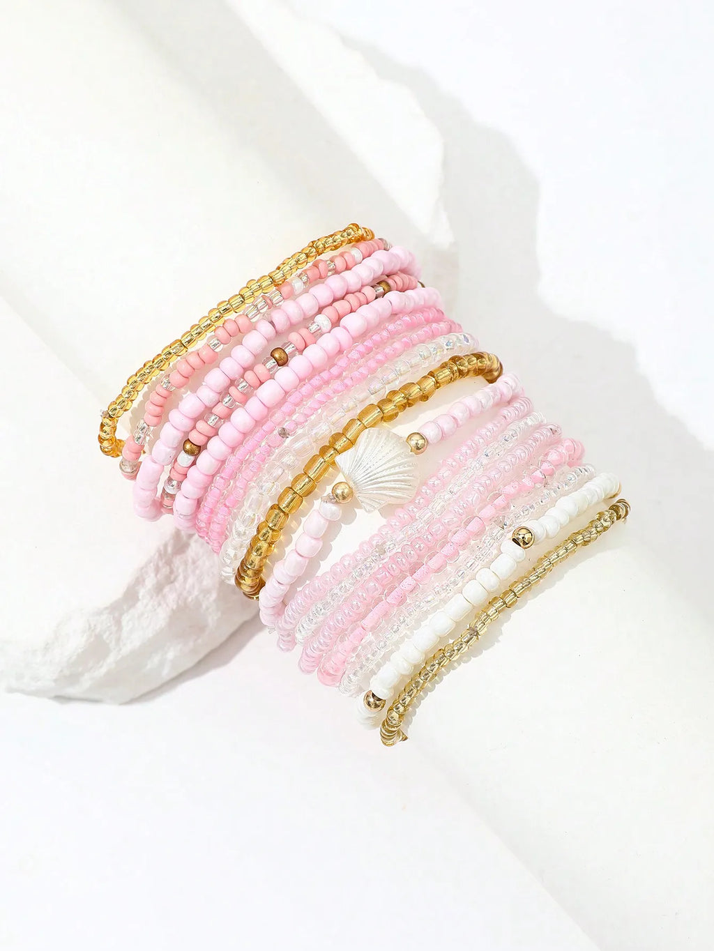 17-Piece Layered Pink Beaded Bracelet Set with Shell Charm and Gold Accents